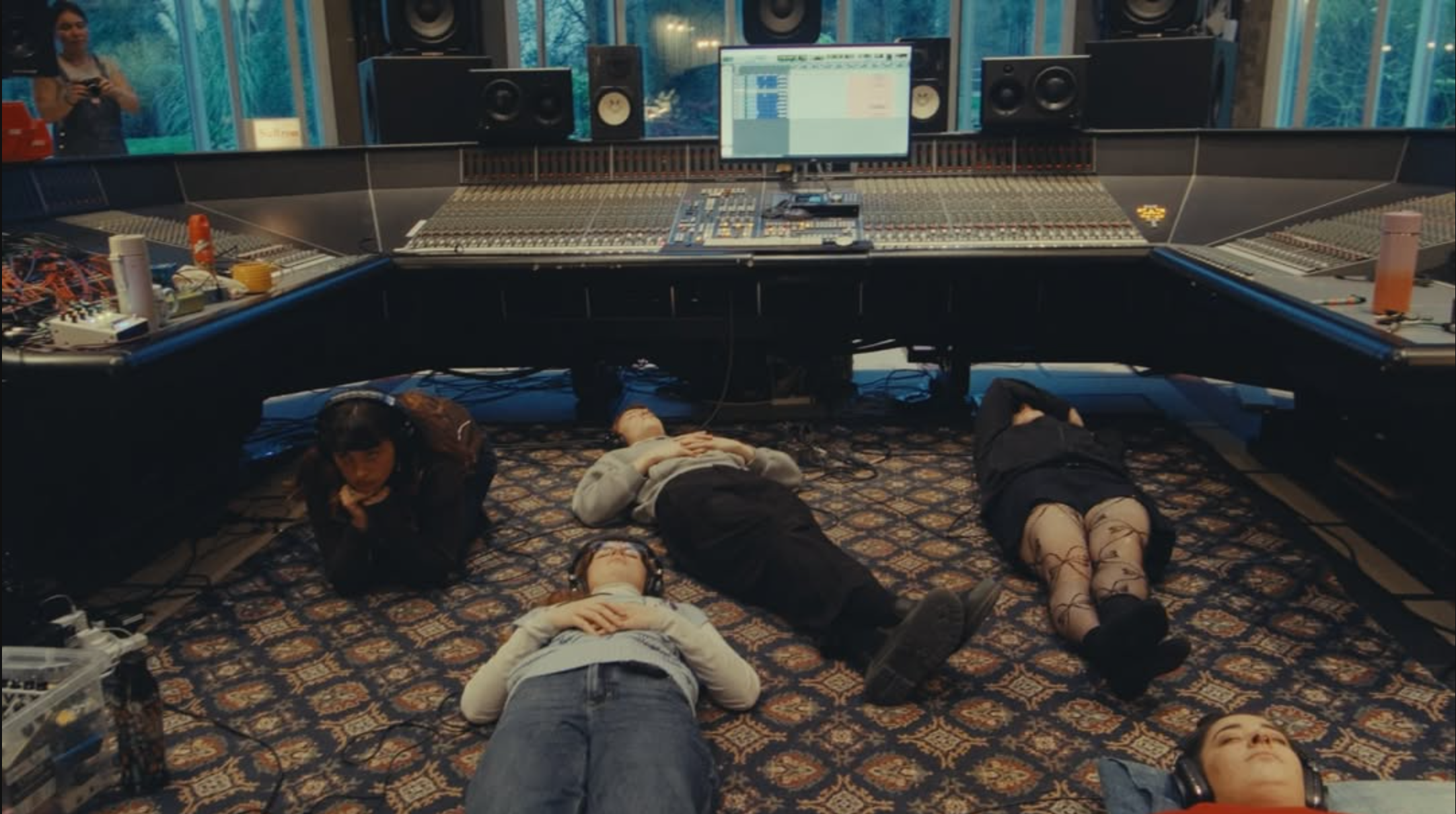 Screenshot 2026-07-28 at 21.42.09 people lying on the floor of a music studio